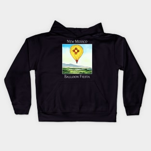 Hot air balloon flying over Albuquerque New Mexico during the Balloon Fiesta. Kids Hoodie